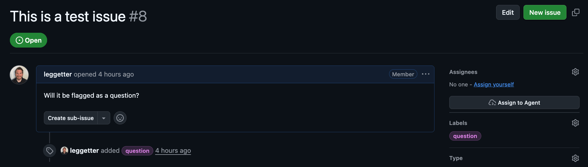 GitHub issue titled "This is a test issue" with the question label automatically applied by Claude